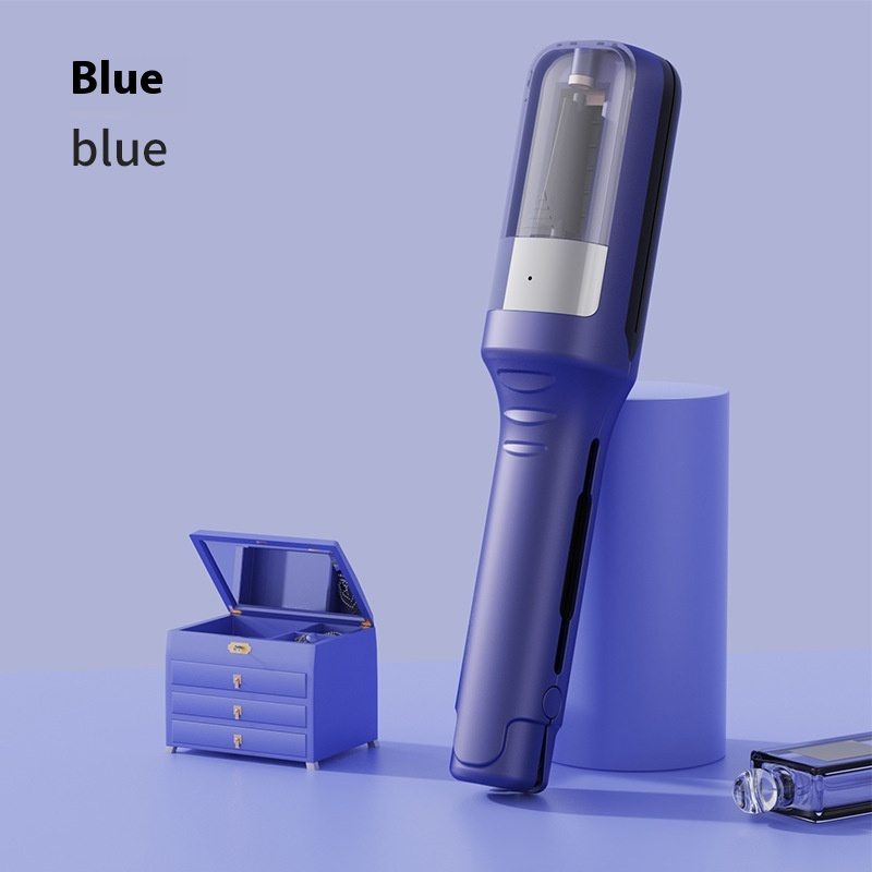 Cordless hair styling tool showing trimmer blade detail